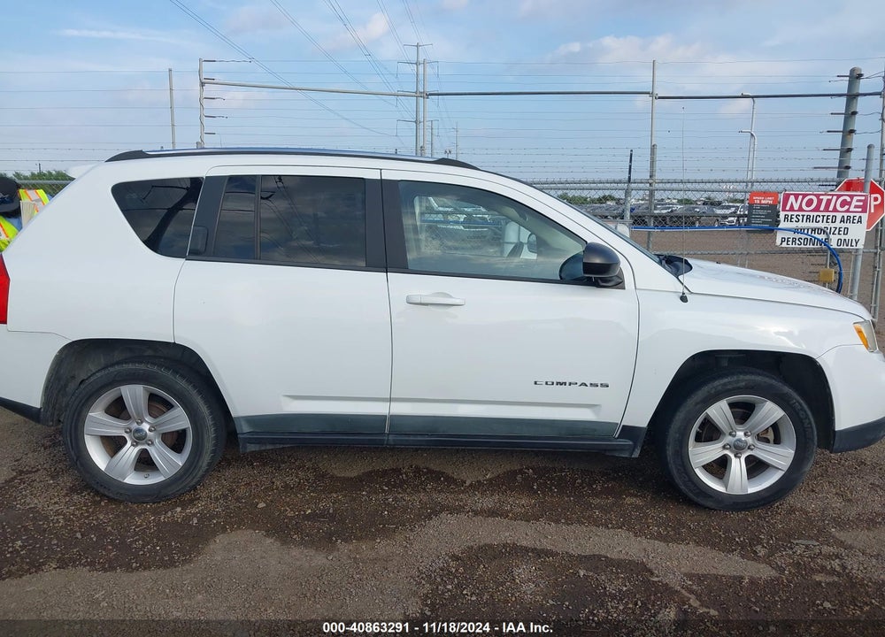 2011 JEEP COMPASS VIN: 1J4NT1FA4BD289957
