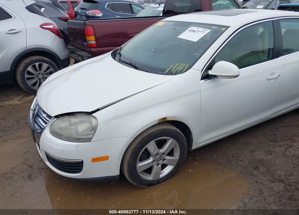 2009 VOLKSWAGEN JETTA VIN: 3VWRM71K99M088591