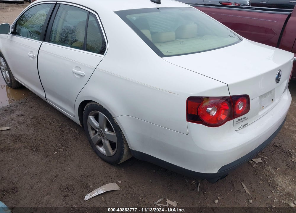 2009 VOLKSWAGEN JETTA VIN: 3VWRM71K99M088591