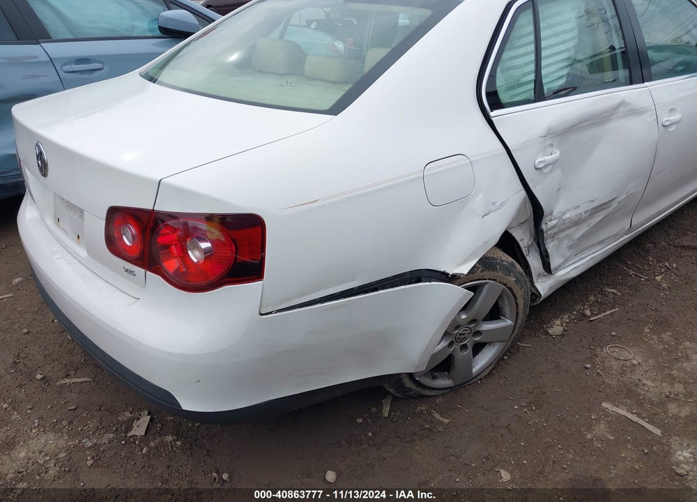 2009 VOLKSWAGEN JETTA VIN: 3VWRM71K99M088591