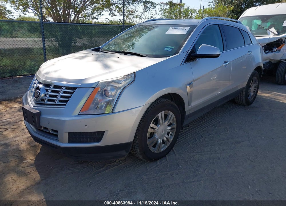 2014 CADILLAC SRX LUXURY COLLECTION VIN: 3GYFNBE39ES585391