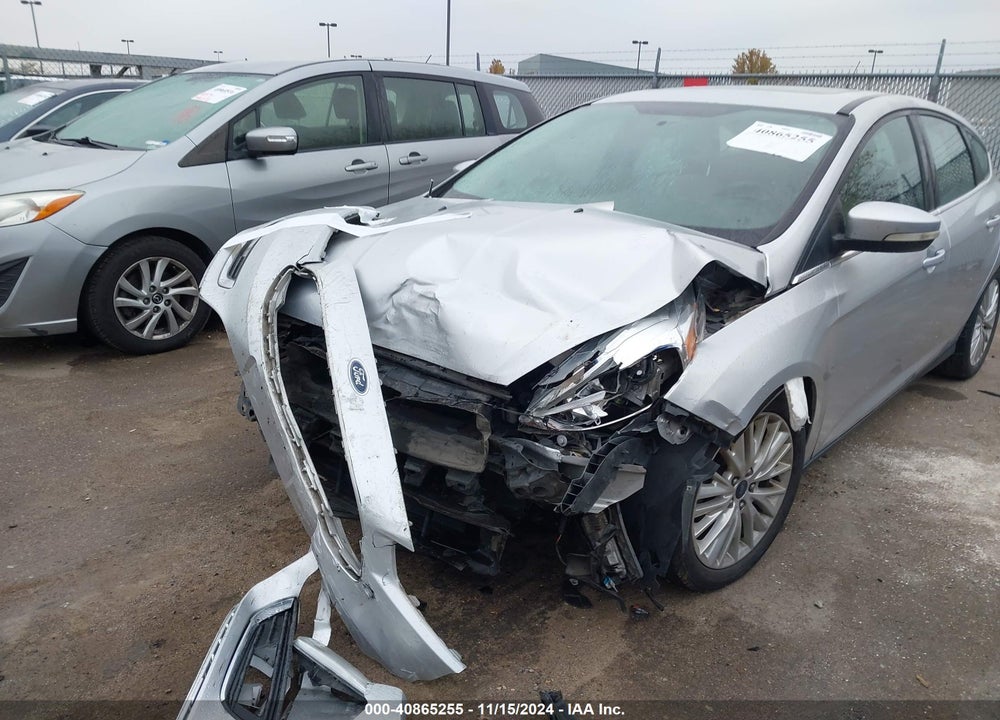 2016 FORD FOCUS TITANIUM VIN: 1FADP3N25GL271739