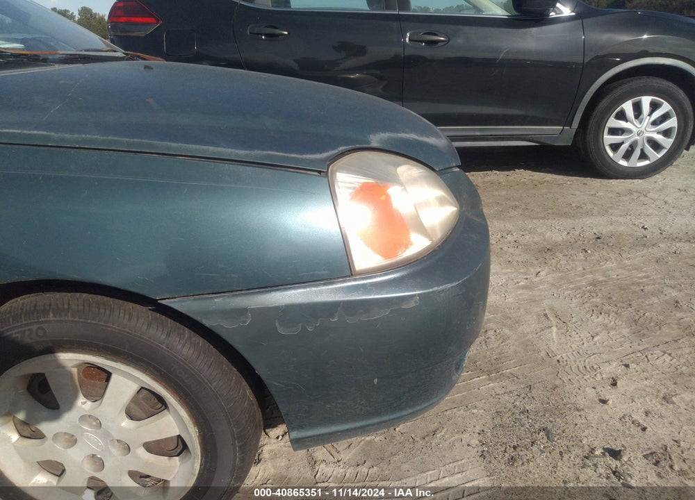 2003 KIA RIO CINCO VIN: KNADC165536138293