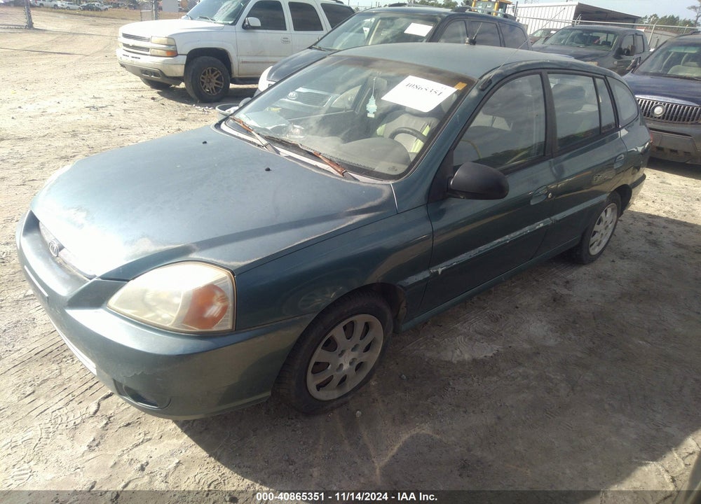 2003 KIA RIO CINCO VIN: KNADC165536138293