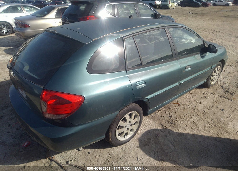 2003 KIA RIO CINCO VIN: KNADC165536138293