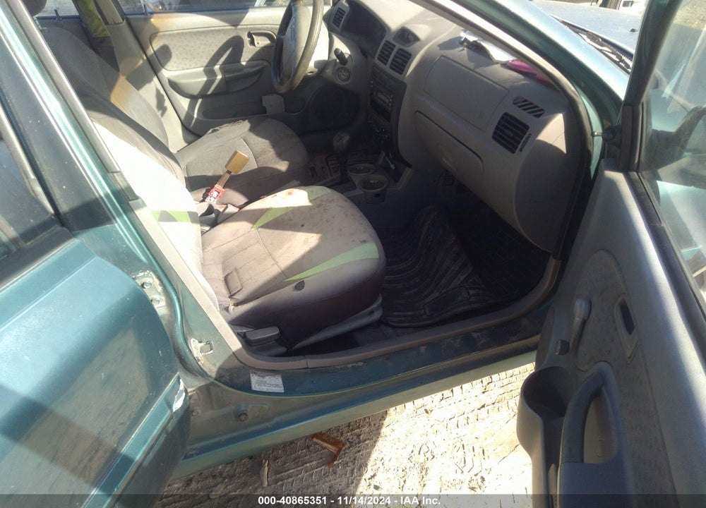 2003 KIA RIO CINCO VIN: KNADC165536138293