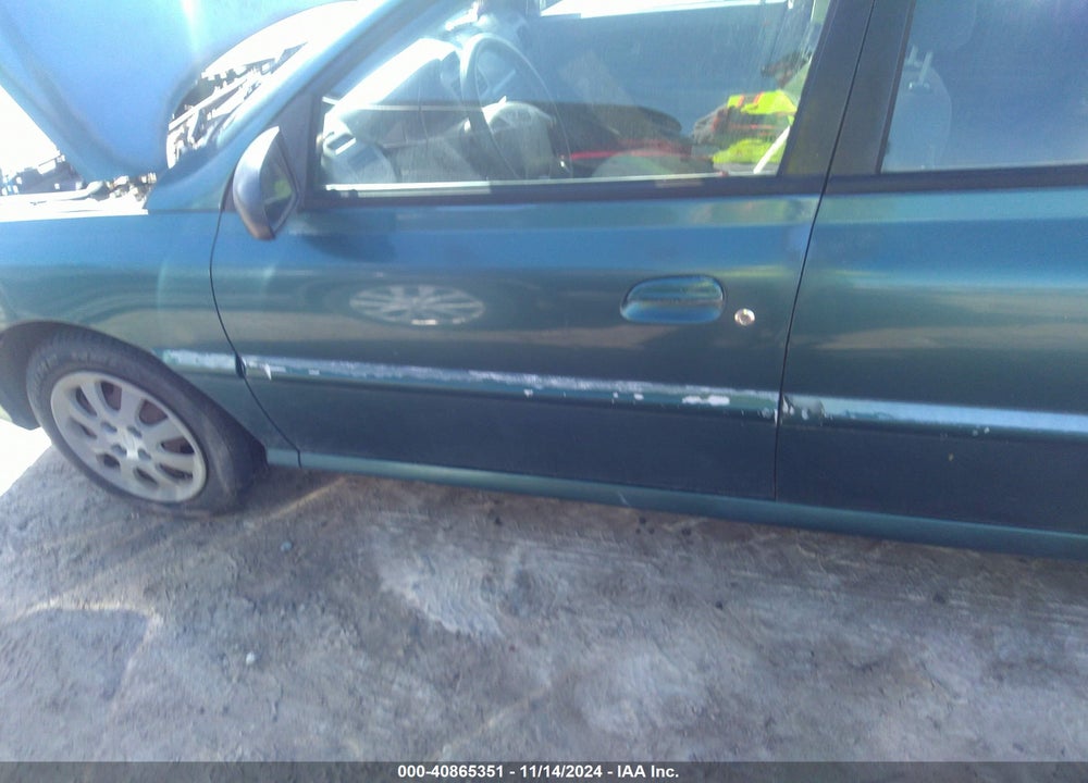 2003 KIA RIO CINCO VIN: KNADC165536138293