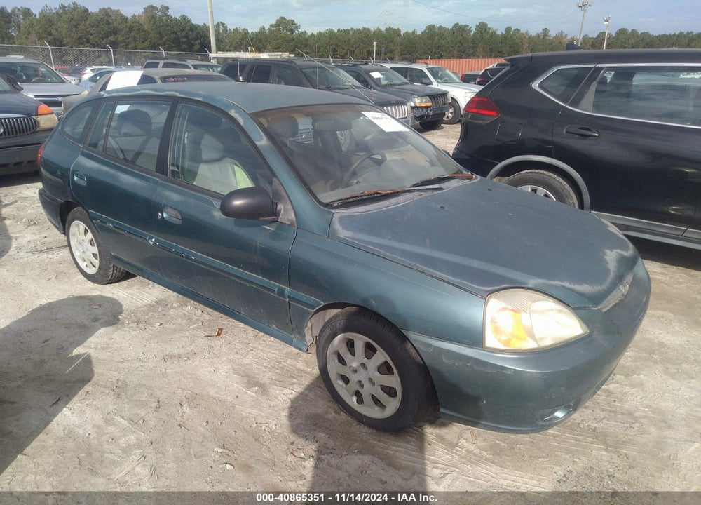 2003 KIA RIO CINCO VIN: KNADC165536138293