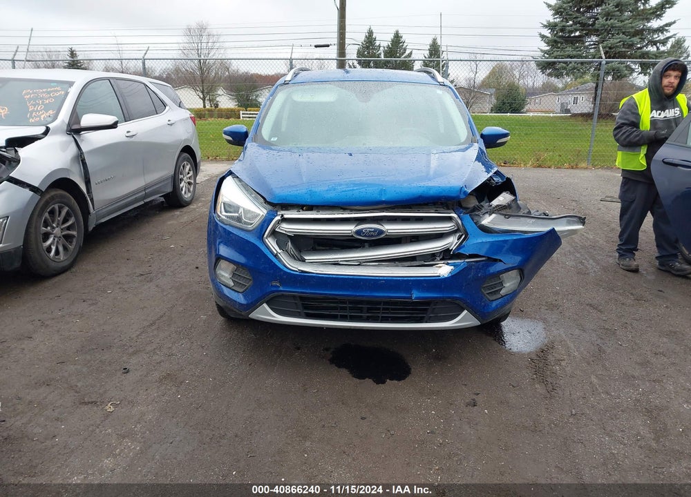2017 FORD ESCAPE TITANIUM VIN: 1FMCU9J93HUA64083