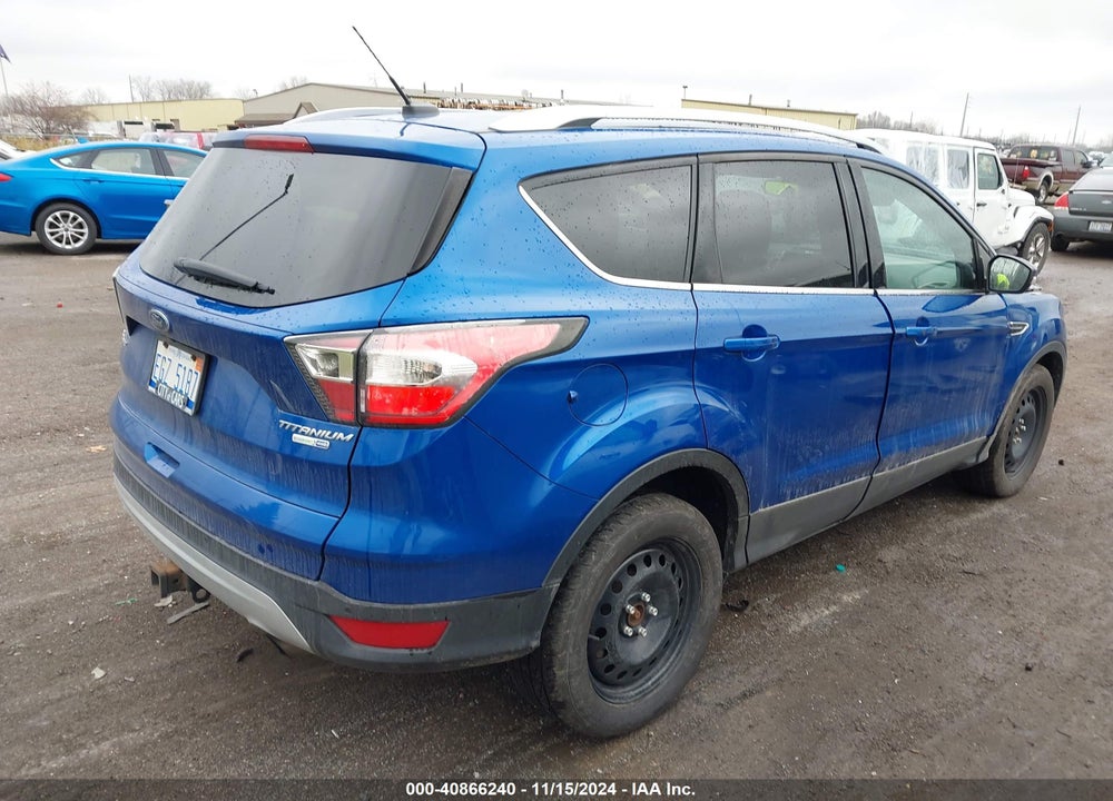 2017 FORD ESCAPE TITANIUM VIN: 1FMCU9J93HUA64083