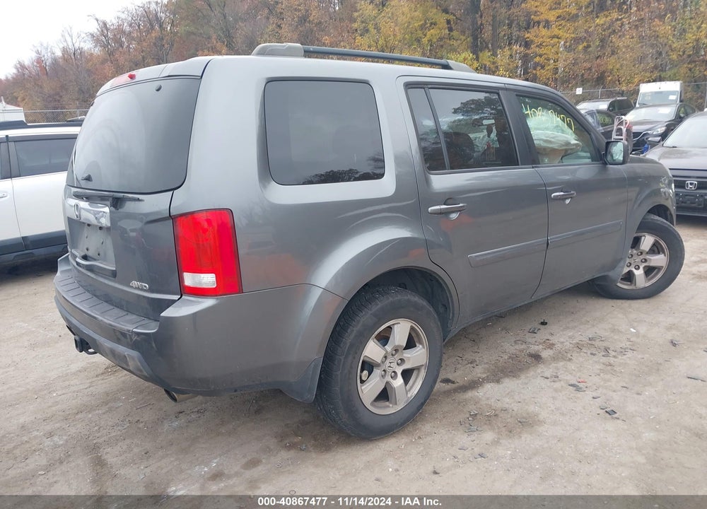 2011 HONDA PILOT EX-L VIN: 5FNYF4H76BB023779