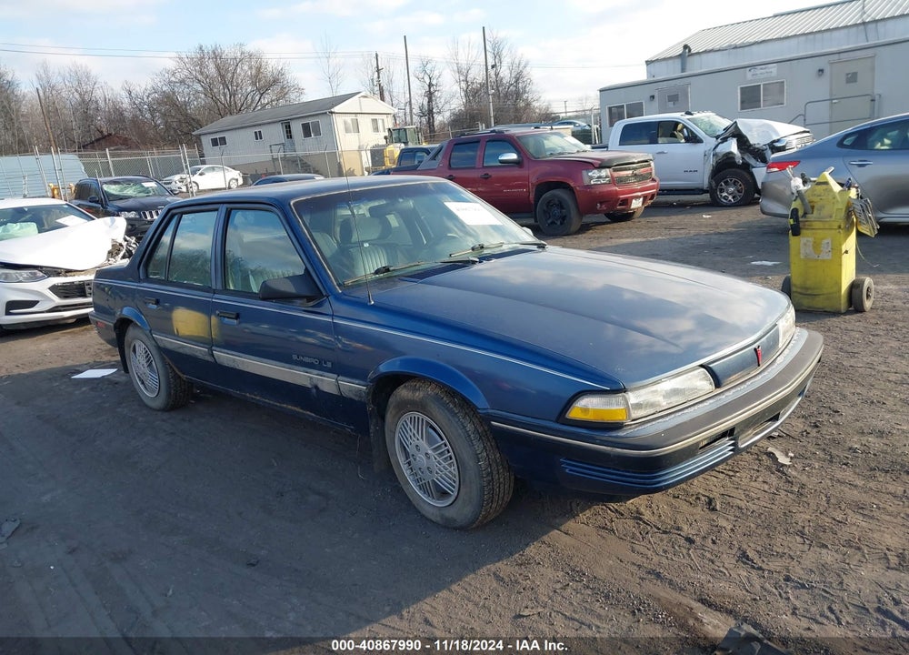 1991 PONTIAC SUNBIRD LE VIN: 1G2JB54K1M7613317