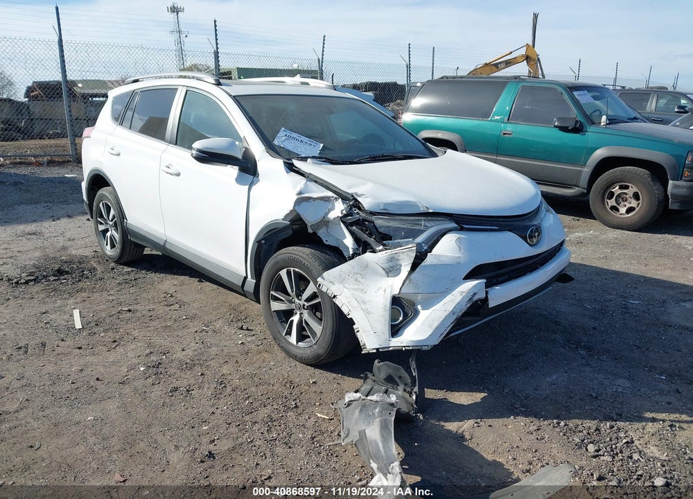 2018 TOYOTA RAV4 ADVENTURE/XLE VIN: 2T3RFREV4JW748505