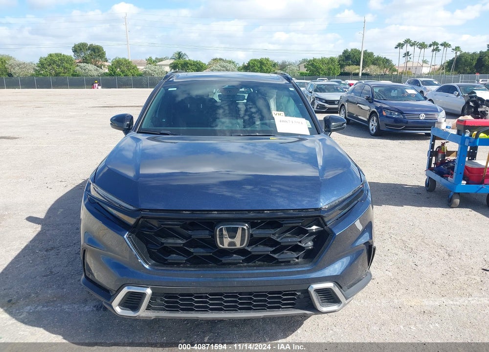 2024 HONDA CR-V HYBRID SPORT TOURING VIN: 7FARS6H93RE026070