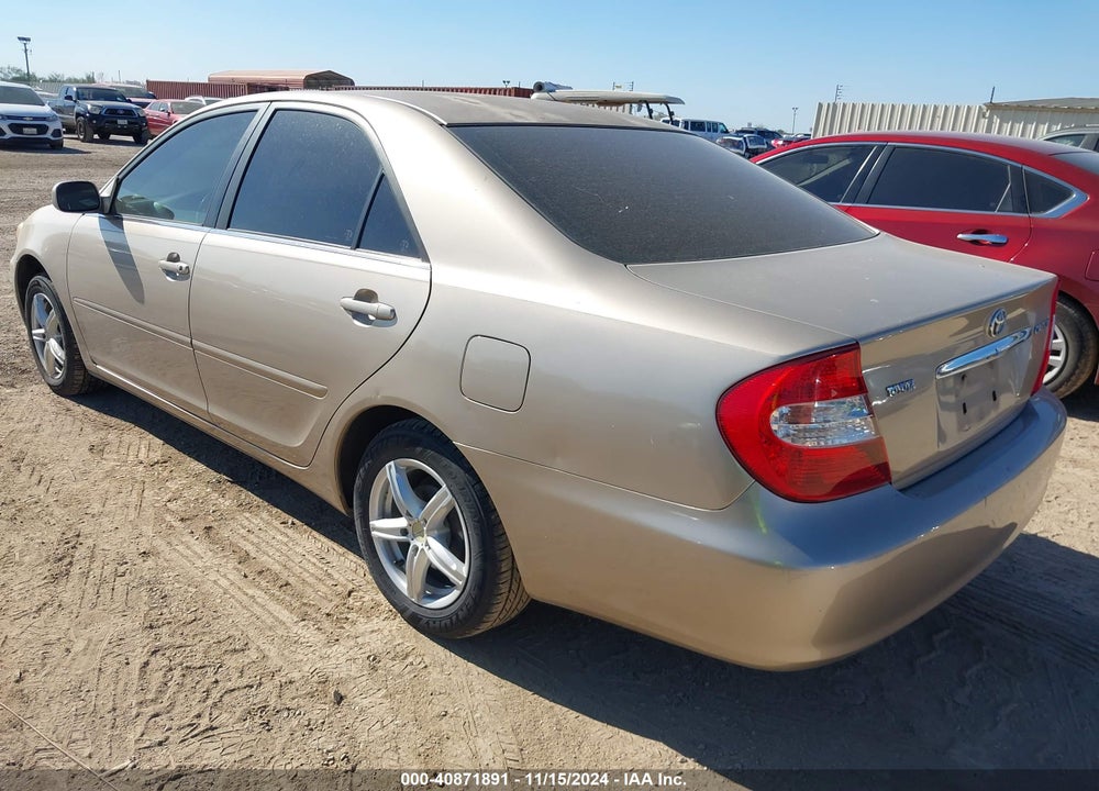 2002 TOYOTA CAMRY LE VIN: JTDBE32K020071390