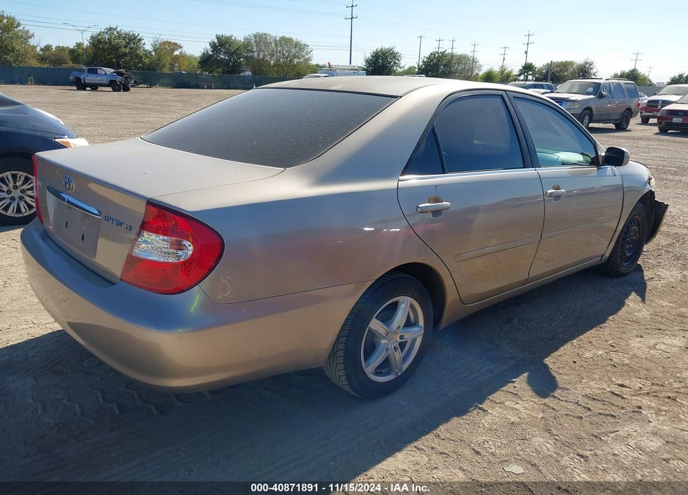 2002 TOYOTA CAMRY LE VIN: JTDBE32K020071390