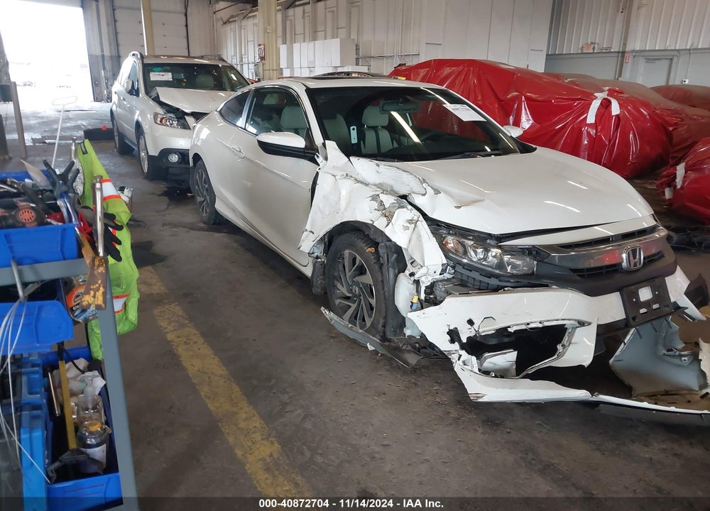 2018 HONDA CIVIC LX-P VIN: 2HGFC4B05JH306468