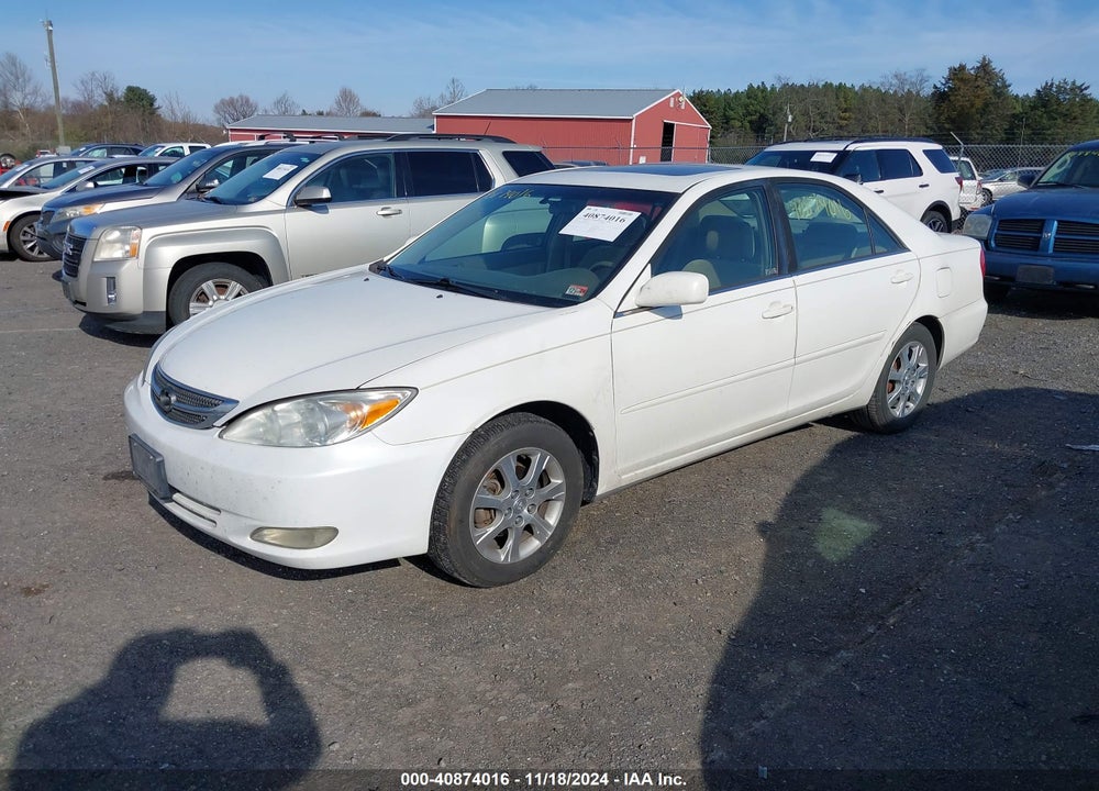 2004 TOYOTA CAMRY LE VIN: JTDBE32K940283448