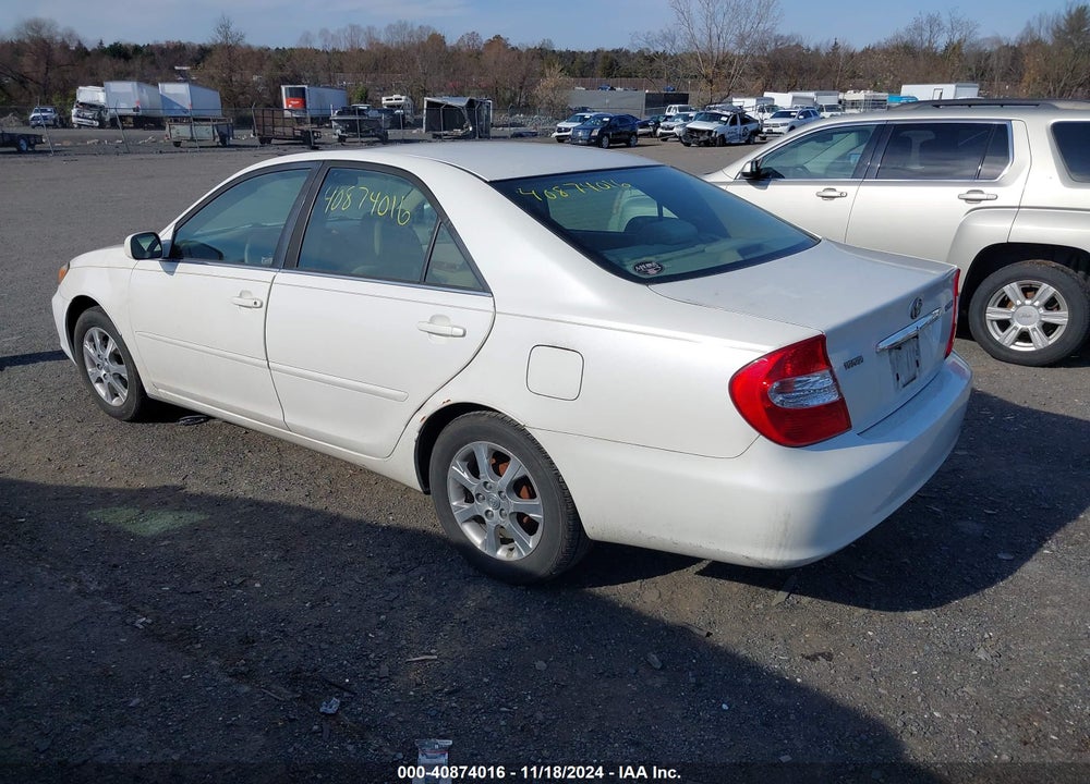2004 TOYOTA CAMRY LE VIN: JTDBE32K940283448