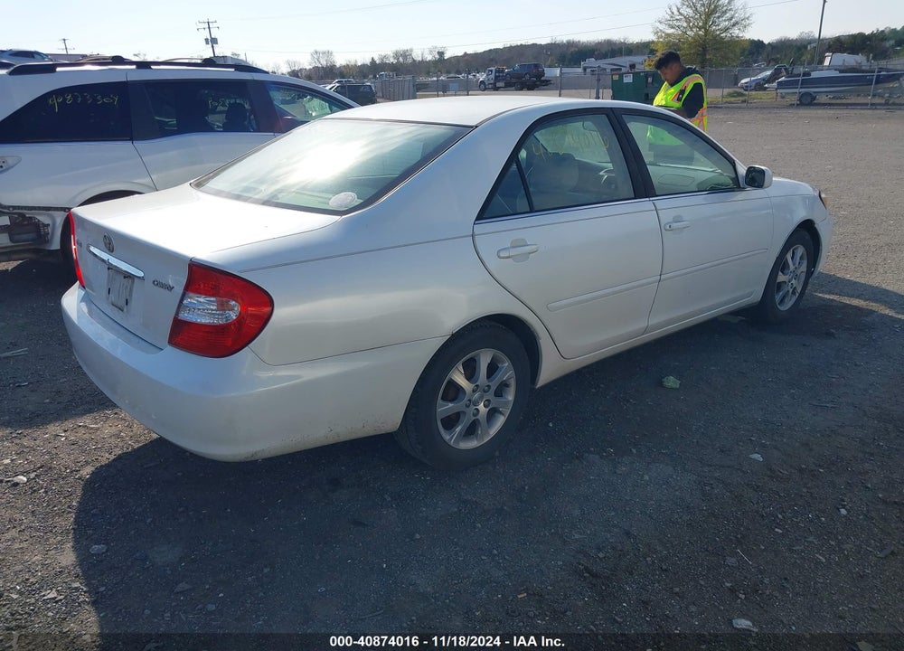 2004 TOYOTA CAMRY LE VIN: JTDBE32K940283448