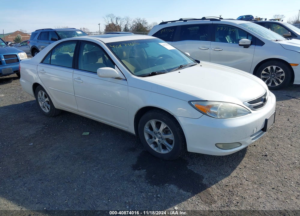 2004 TOYOTA CAMRY LE VIN: JTDBE32K940283448