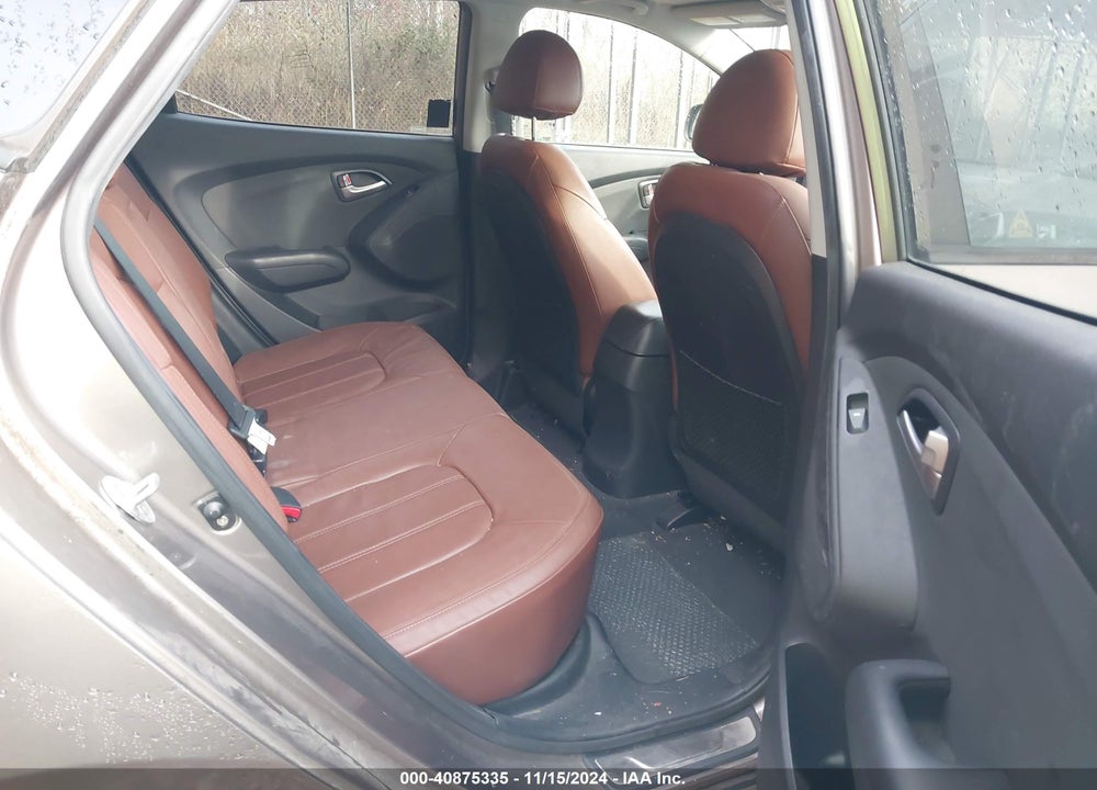 2011 HYUNDAI TUCSON VIN: KM8JUCAC0BU312698
