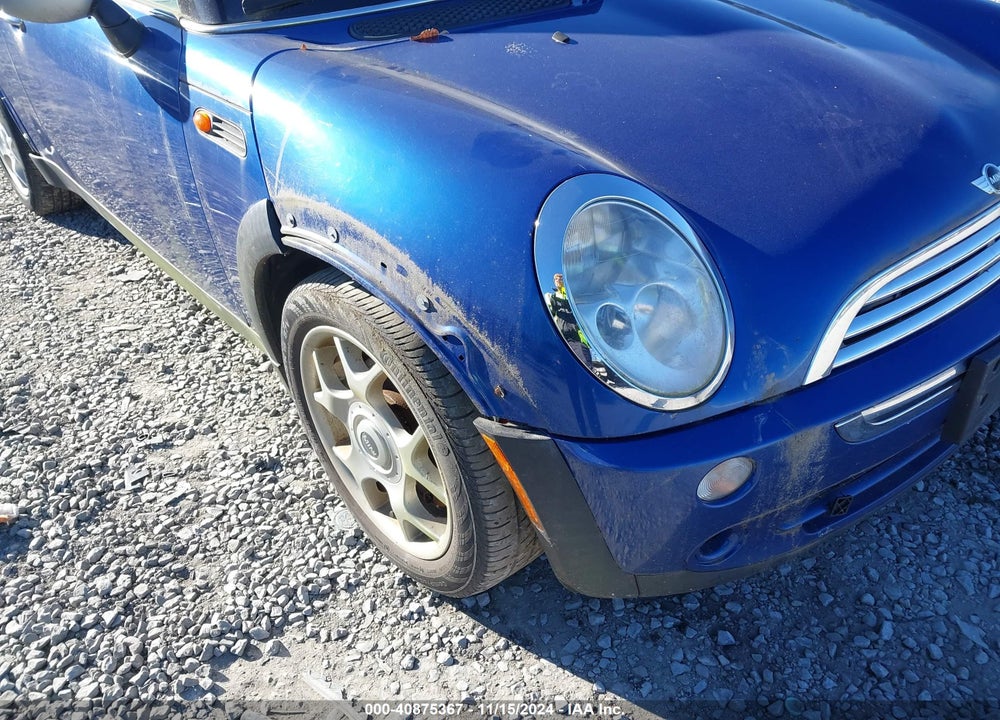 2006 MINI COOPER VIN: WMWRC33516TK66073