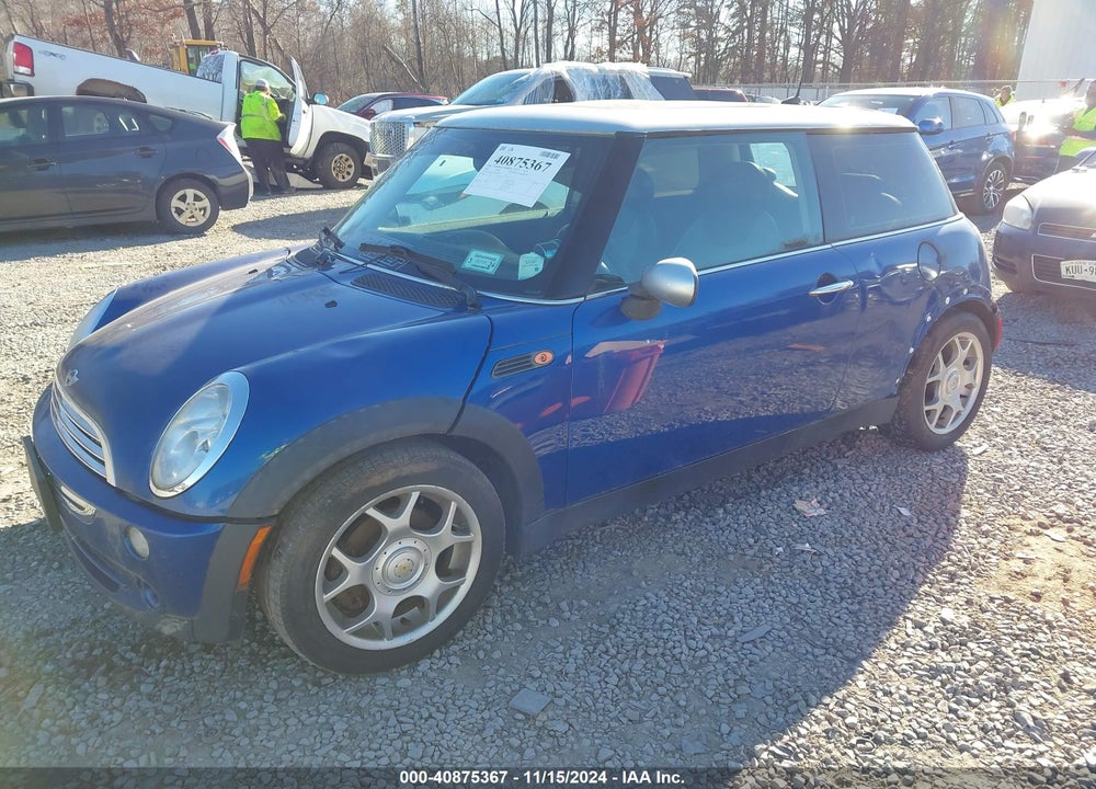 2006 MINI COOPER VIN: WMWRC33516TK66073