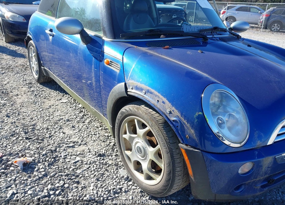 2006 MINI COOPER VIN: WMWRC33516TK66073