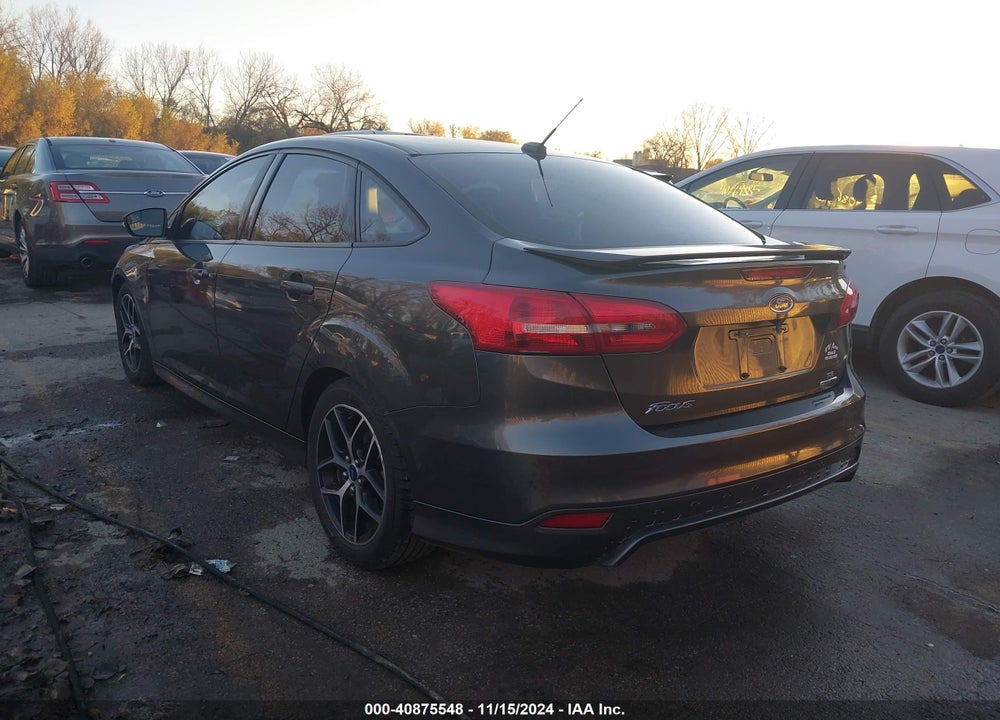 2015 FORD FOCUS SE VIN: 1FADP3F21FL210577