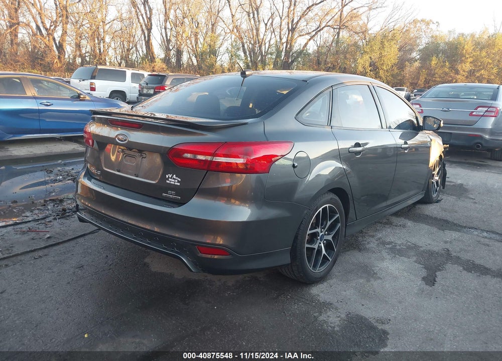 2015 FORD FOCUS SE VIN: 1FADP3F21FL210577