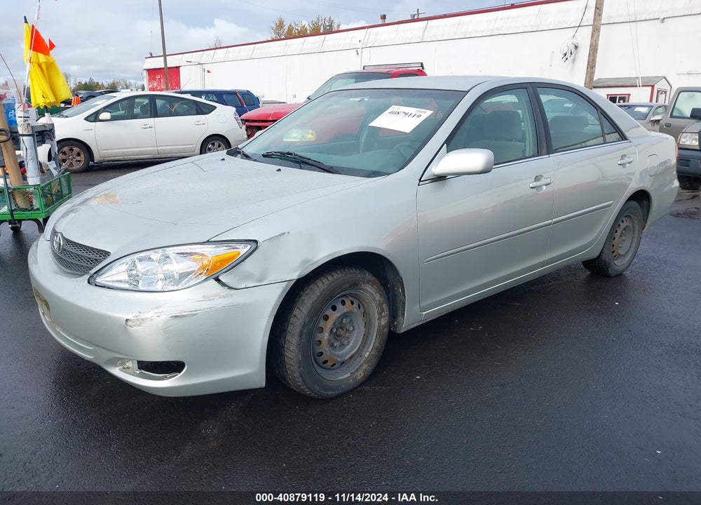 2003 TOYOTA CAMRY LE VIN: JTDBE32K730143445