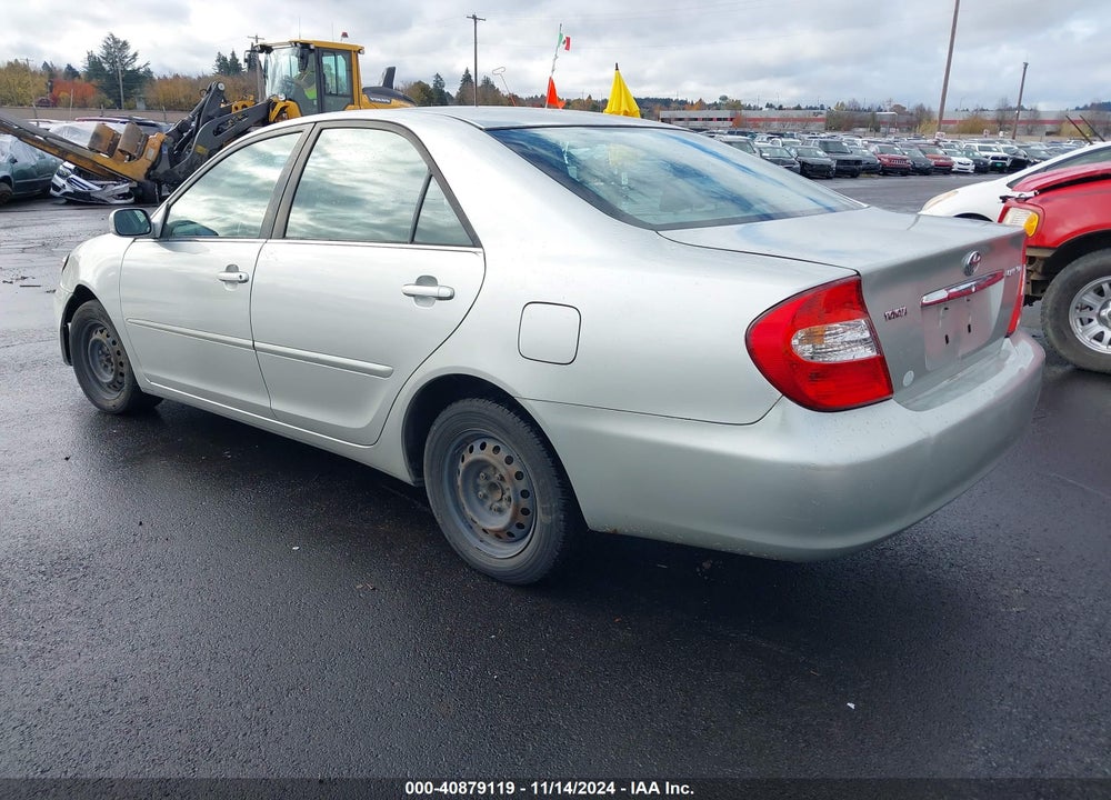 2003 TOYOTA CAMRY LE VIN: JTDBE32K730143445