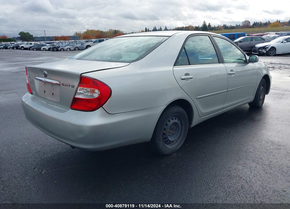 2003 TOYOTA CAMRY LE VIN: JTDBE32K730143445