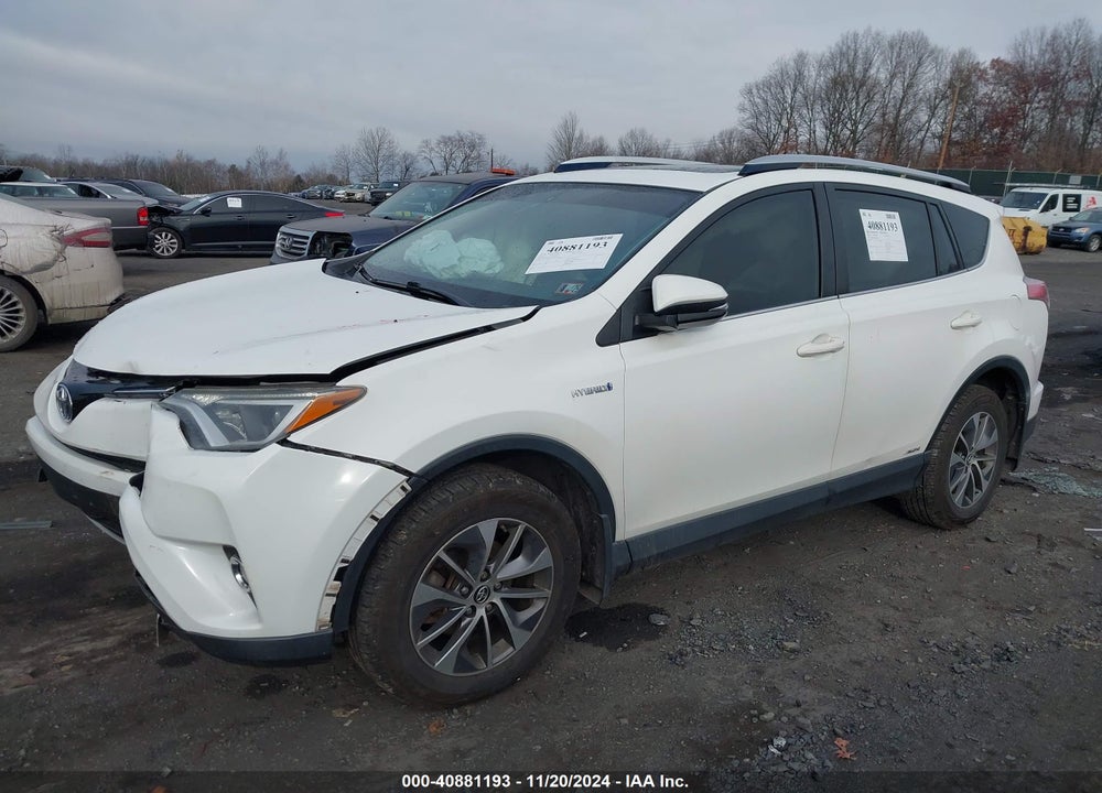 2016 TOYOTA RAV4 HYBRID XLE VIN: JTMRJREV4GD042056