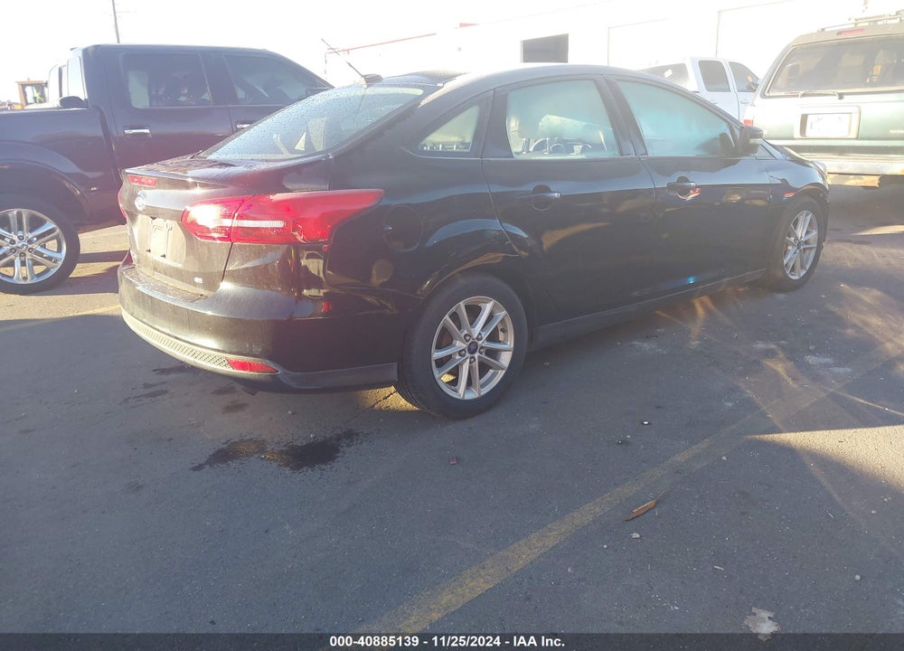 2016 FORD FOCUS VIN: 1FADP3F20GL345292