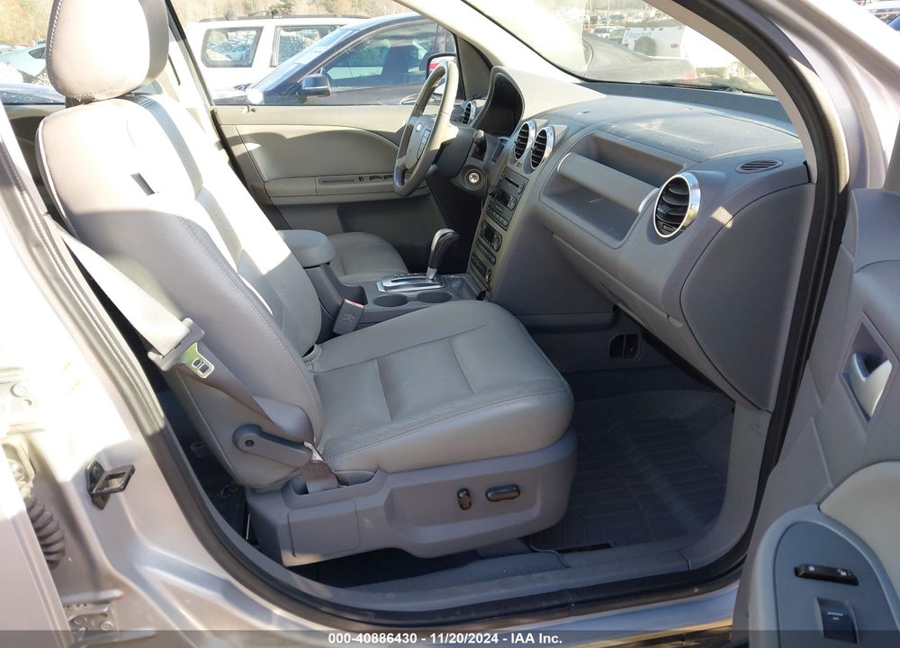 2005 FORD FREESTYLE SEL VIN: 1FMDK05125GA11489