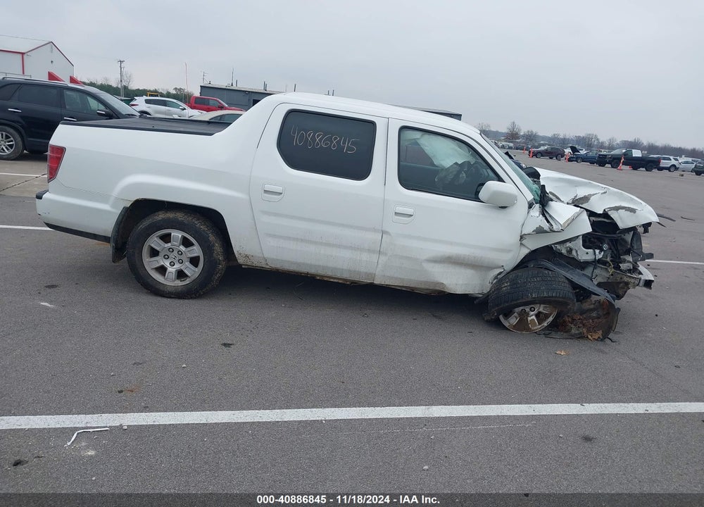 2011 HONDA RIDGELINE RTL VIN: 5FPYK1F56BB502643