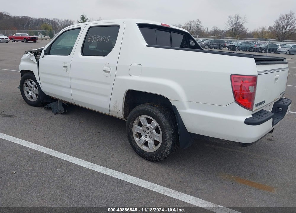 2011 HONDA RIDGELINE RTL VIN: 5FPYK1F56BB502643