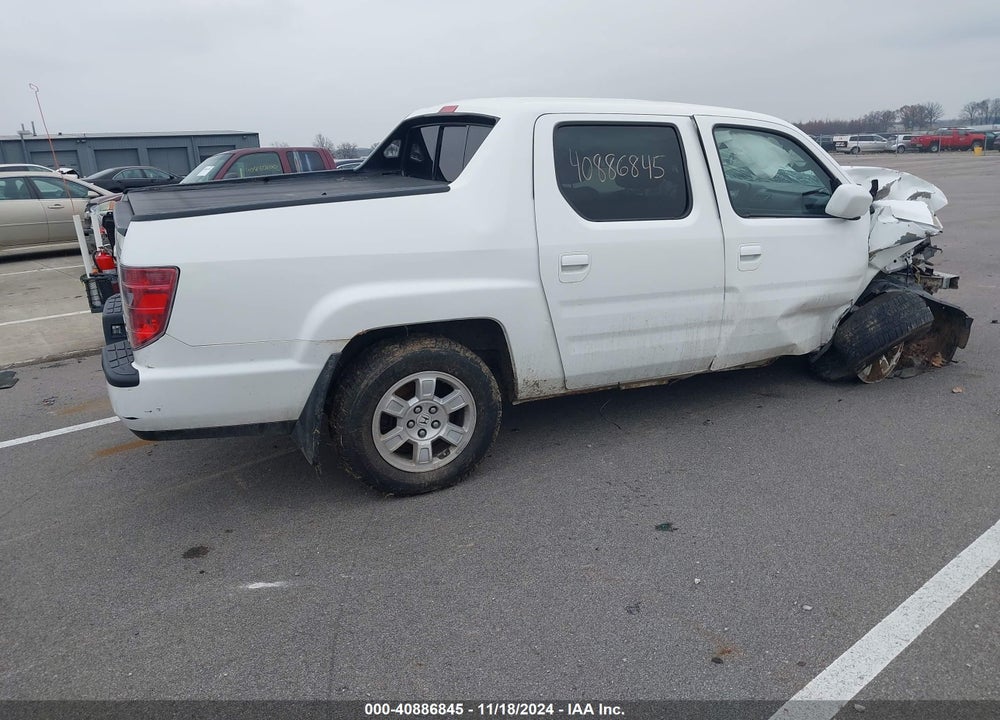 2011 HONDA RIDGELINE RTL VIN: 5FPYK1F56BB502643