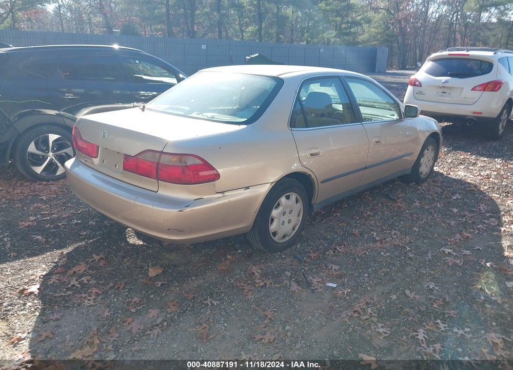 2000 HONDA ACCORD 2.3 LX VIN: 1HGCG6654YA113438