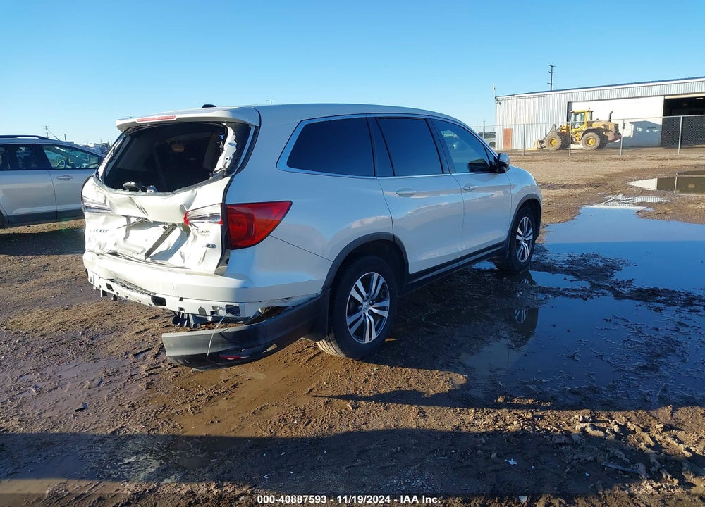 2016 HONDA PILOT EX-L VIN: 5FNYF6H89GB097662