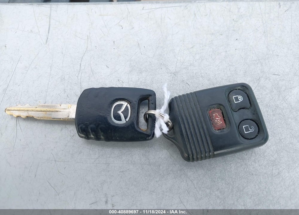 2006 MAZDA TRIBUTE I VIN: 4F2YZ02Z16KM27589