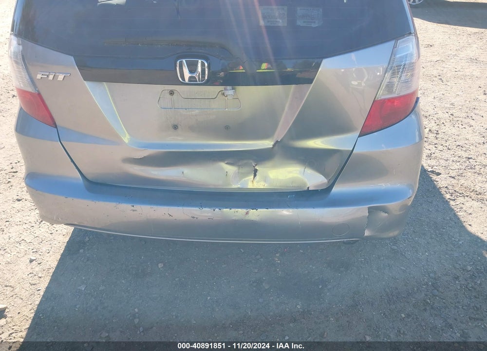 2009 HONDA FIT SPORT VIN: JHMGE88669S000818