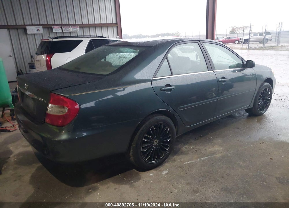 2003 TOYOTA CAMRY LE VIN: 4T1BE30K03U713406