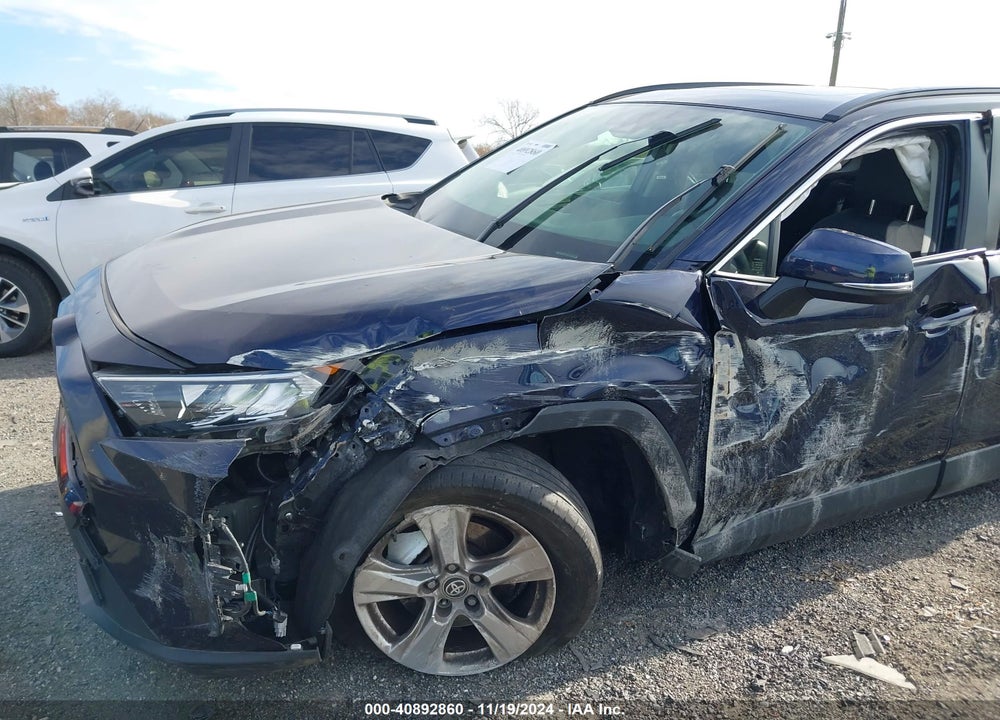 2021 TOYOTA RAV4 XLE VIN: JTMP1RFV5MD077335