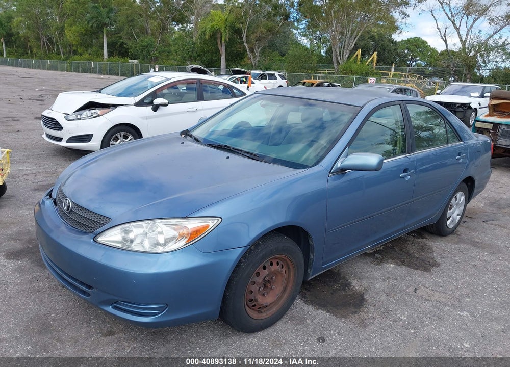2003 TOYOTA CAMRY LE VIN: JTDBE32K630235534