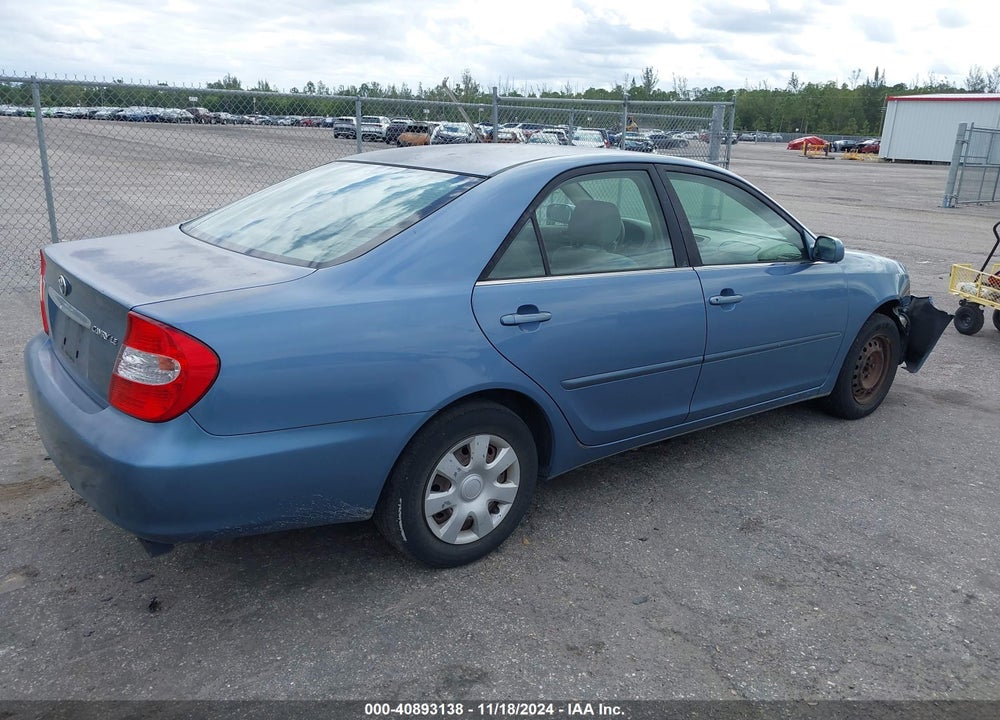 2003 TOYOTA CAMRY LE VIN: JTDBE32K630235534