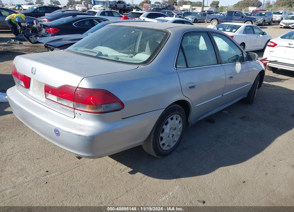 2002 HONDA ACCORD 2.3 LX VIN: 1HGCG66562A144133