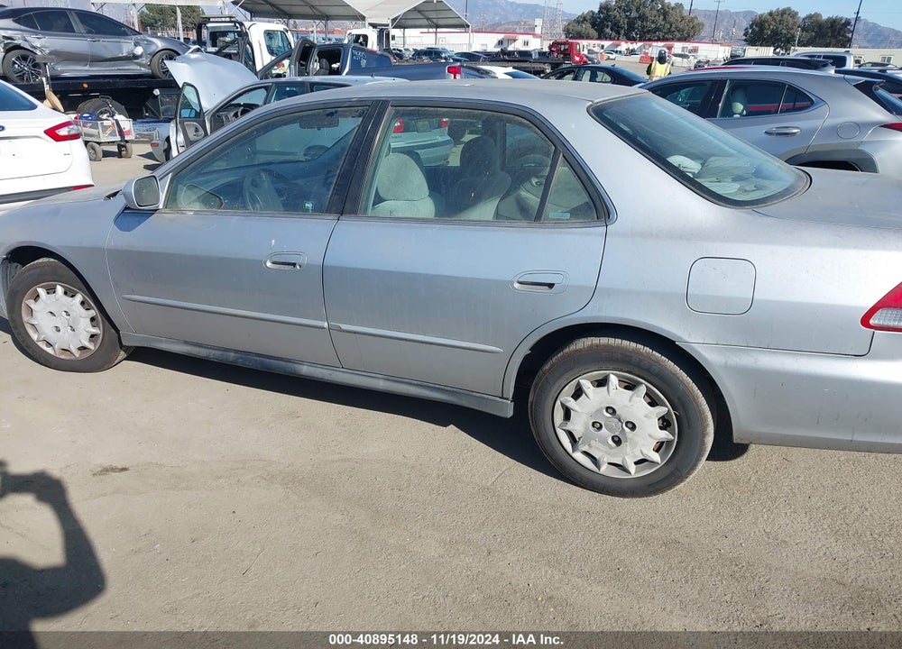 2002 HONDA ACCORD 2.3 LX VIN: 1HGCG66562A144133